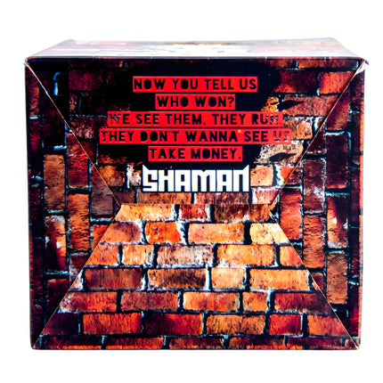 Shaman Coconut Charcoal packaging with bold quote on brick wall and Shaman logo